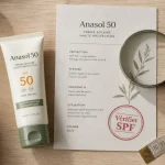 Anasol 50 crème visage SPF 50 sur table